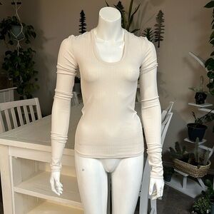 H&M ripped size small stretchy, long sleeve light cream shirt